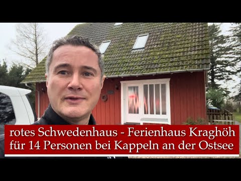 Rotes Schwedenhaus Kraghöh mit Hund